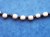 Collier perles blanches et noires